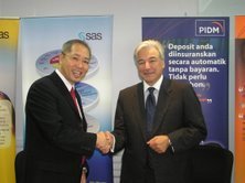 Mr. Jimmy Cheah, Managing Director of SAS Malaysia and Mr. Jean Pierre Sabourin, Chief Executive Officer of PIDM